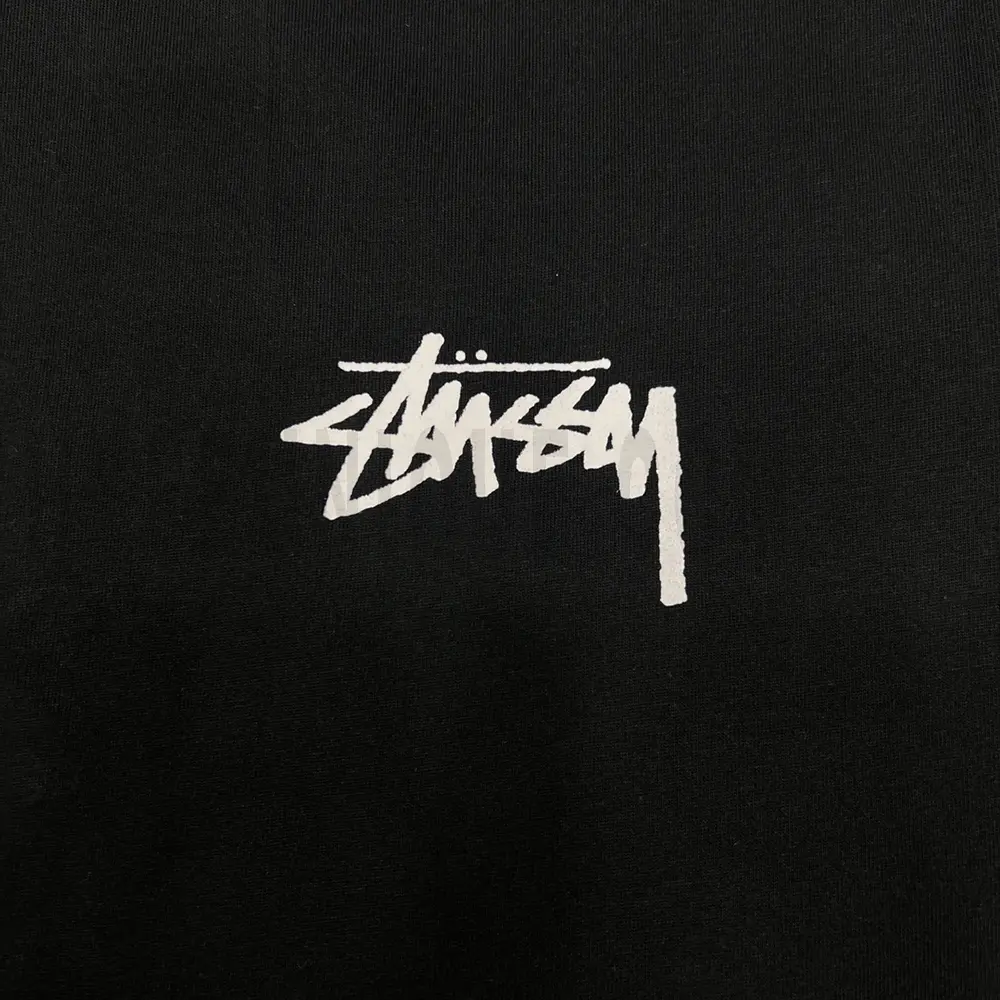 Close-up of the T-shirt print details of the front of the black clothes.