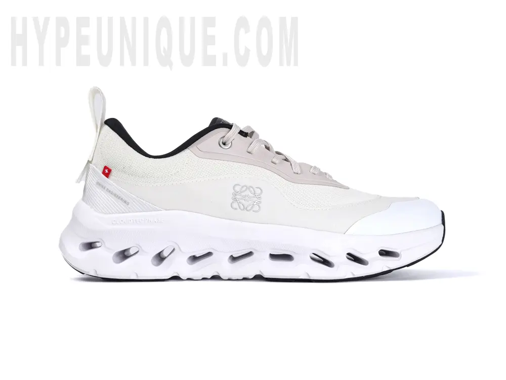 Front view of the medial side of the right shoe of the On Cloudtilt Loewe 2 WMNS Sand / White