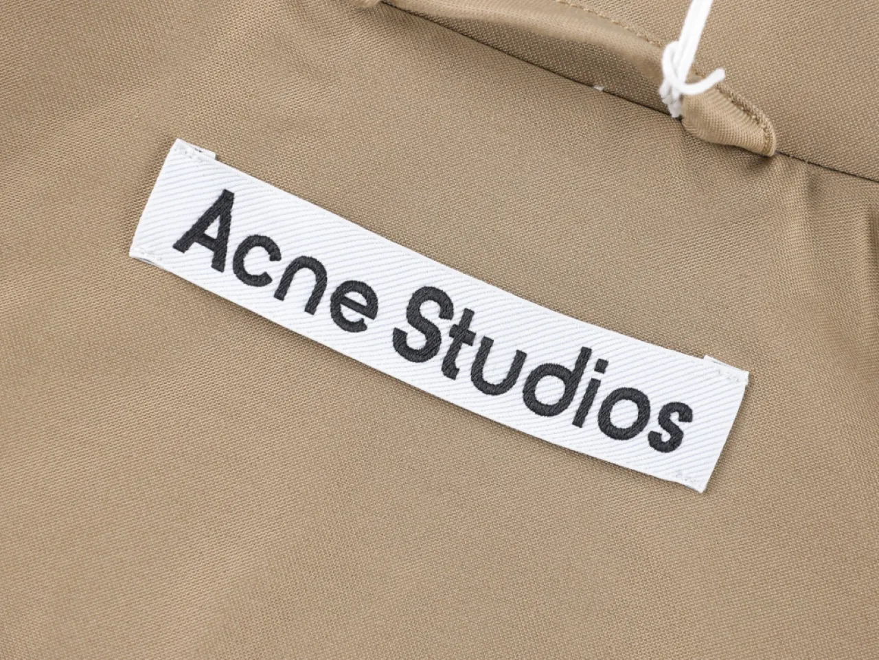 White label with black text Acne Studios
