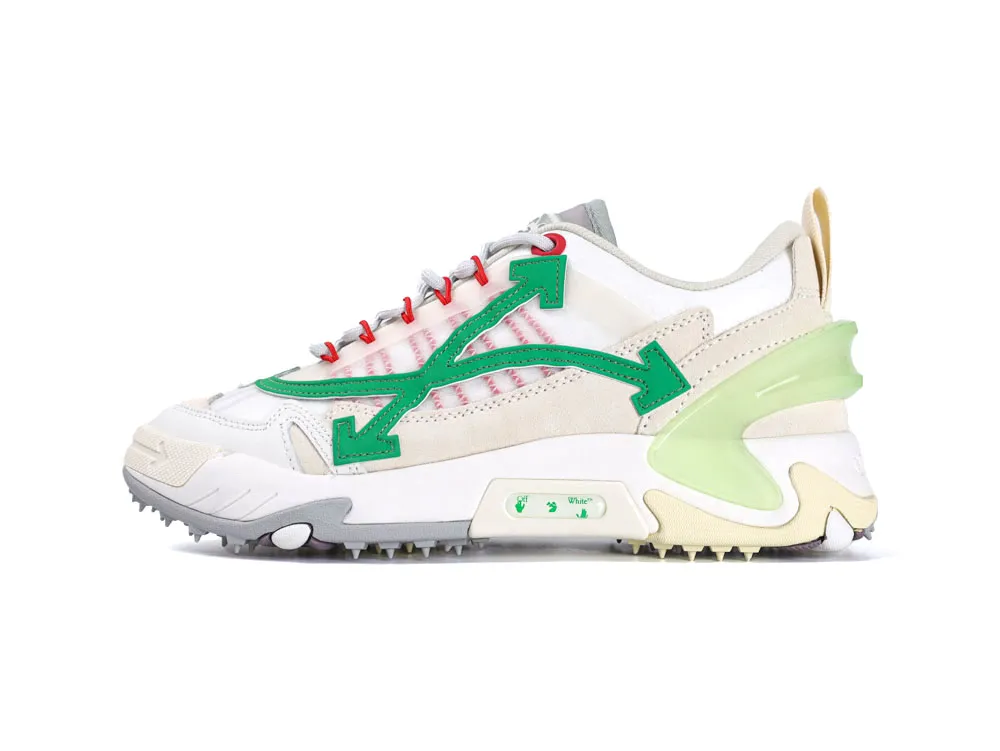 White and beige sneaker with green and red accents, featuring textured rubber sole.
