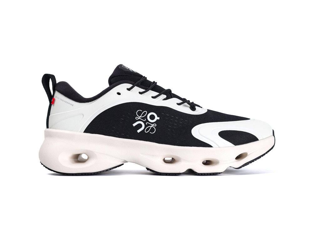 Stylish sneaker with green accents