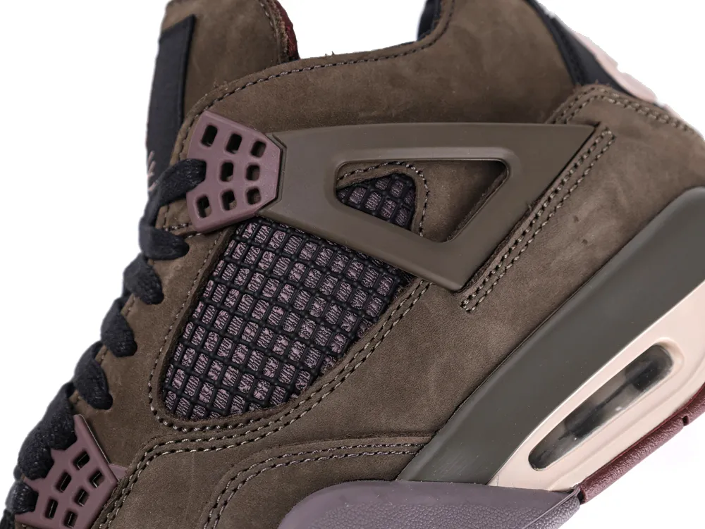 Close-up of olive suede shoe with mesh panel and brown accents.