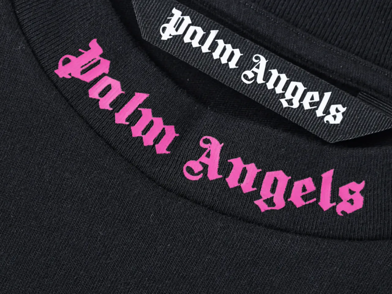 the logo on the neckline