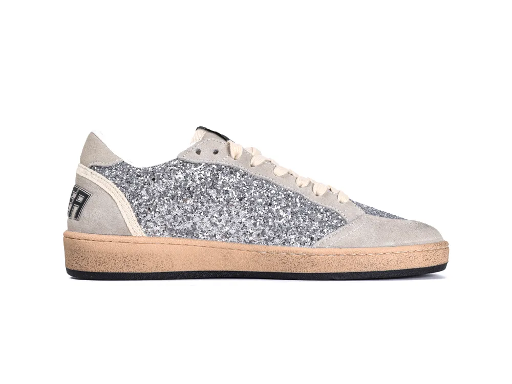 Medial side view of silver glitter Golden Goose Ball Star sneaker in gray suede