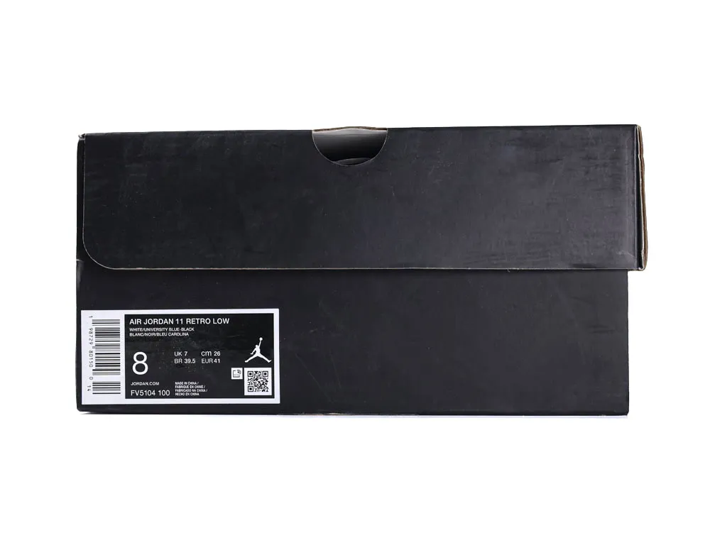 Black cardboard shoe box with a label showing size and branding details.
