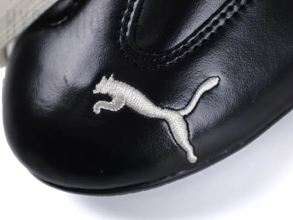 the puma logo on the toe