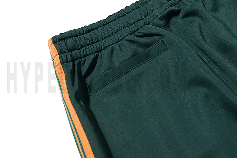 Detail of the back pocket on the track pants.